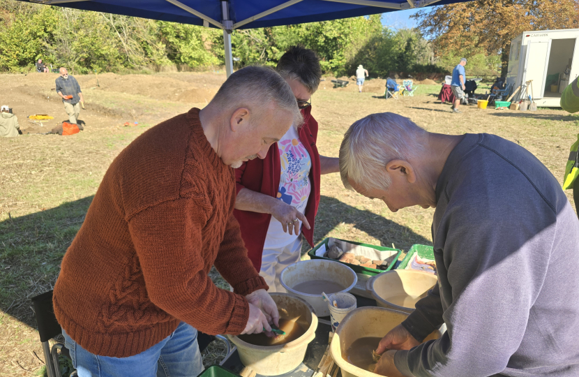 Richard cleaning pottery at the dig project on Manton Lane Bedford
