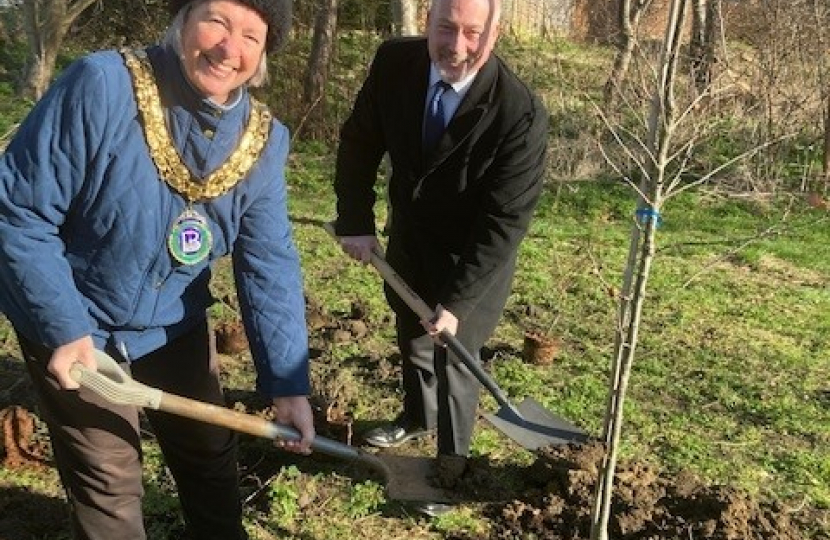 Richard planting an oak with Madeline Russell at The Spinney in Biggleswade.