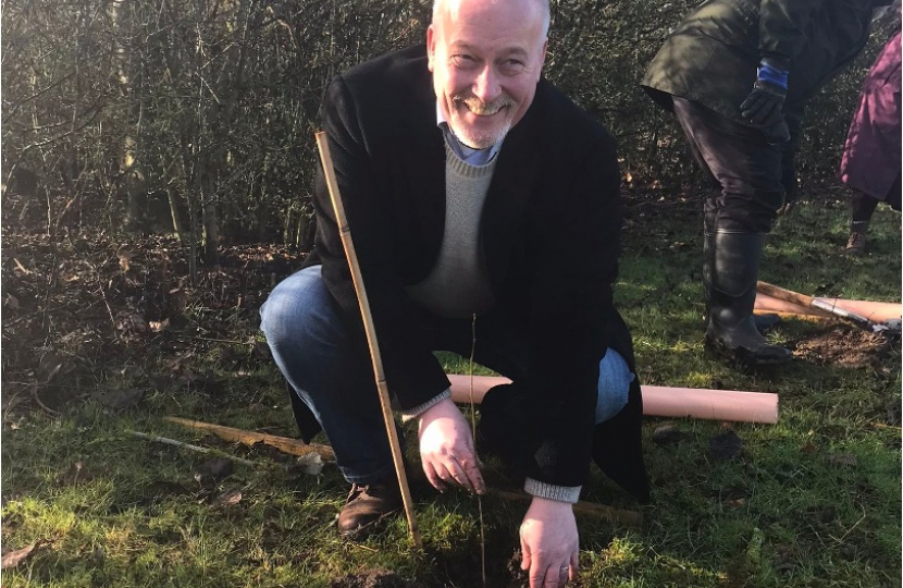 RF planting silver birch at Leslie Sell Centre