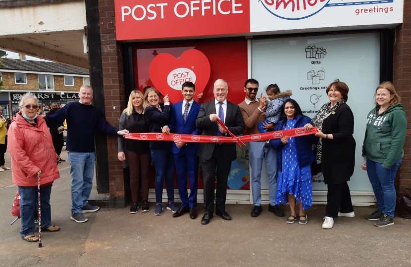 Richard cutting ribbon at Sandy Post Office