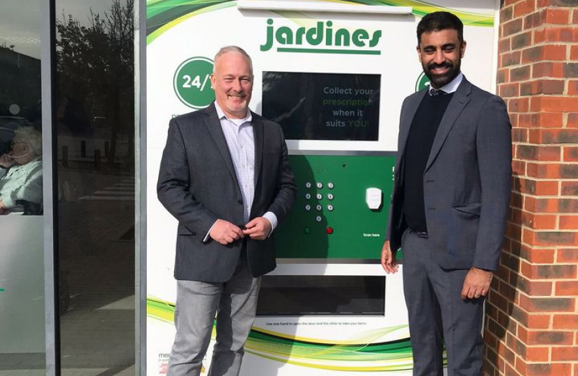 Richard at Jardines Biggleswade opening the new 24/7 prescription collection dispenser