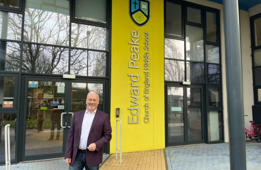 Richard Fuller MP outside Edward Peake School