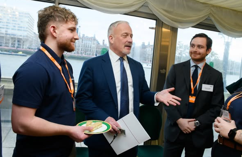 Richard Fuller MP talking with apprentices at the ADS Apprentices Reception in Parliament