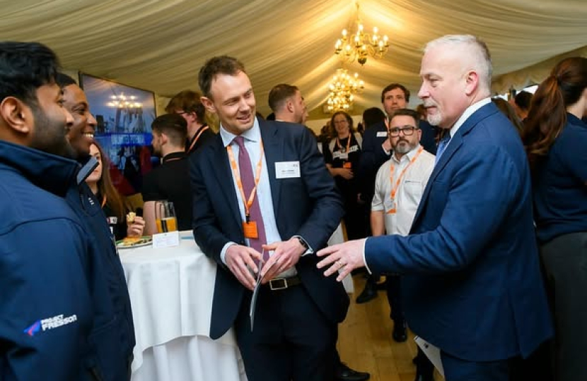 Richard Fuller MP talking with apprentices at the ADS Apprentices Reception in Parliament