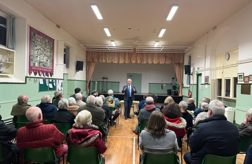 Richard Fuller MP addressing Turvey town hall meeting 