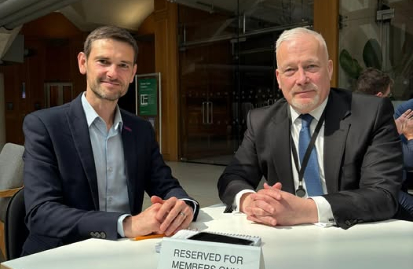 Richard Fuller MP with Adam Wilkinson of Link discussing banking hubs