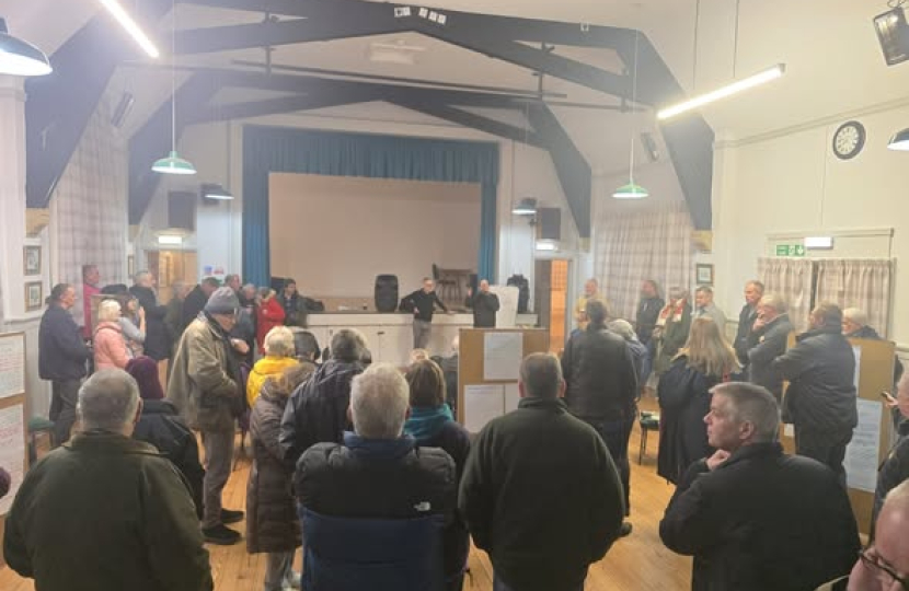 Residents at a meeting to discuss the new town at Tempsford Memorial Hall