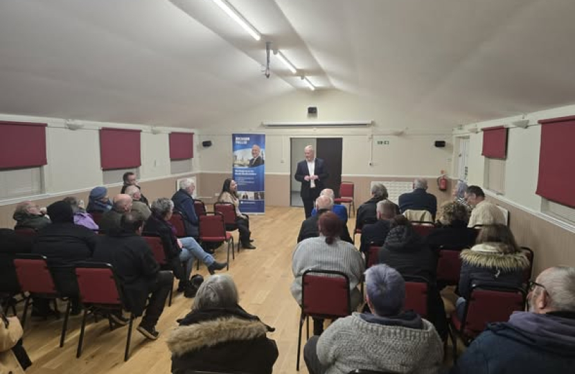 Richard Fuller MP addressing resident in Wyboston village hall