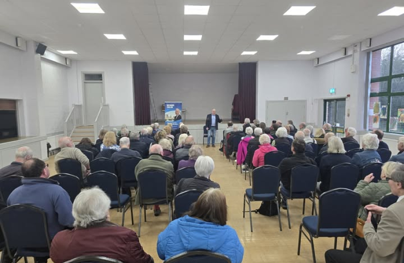 Richard Fuller MP at Bromham Village Hall addressing a public meeting