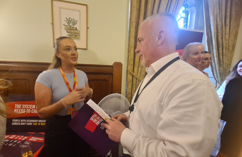 Richard Fuller MP with Abi from Breast Cancer Now at a drop-in event in Parliament