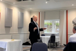 Richard addressing the Breakfast Club
