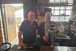 Richard Fuller MP pulling a pint at the Sir William Peel pub in Sandy