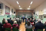 Richard Fuller MP addressing Turvey town hall meeting 