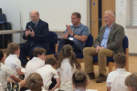 Headmaster Mr Leigh Pointon, Richard Fuller MP and Cllr Jim Weir listening to presentations from students at Riseley and Wilden Primary Schools