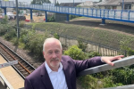 Richard Fuller MP at Biggleswade Railway station with new ramps in background