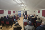 Richard Fuller MP addressing resident in Wyboston village hall