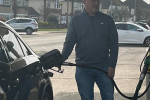 Richard filling his car with petrol and Bromham petrol station