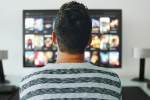 Image of a man watching television