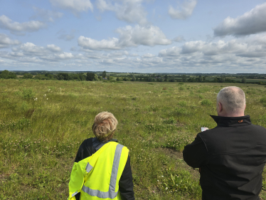 Richard looking across an affected field