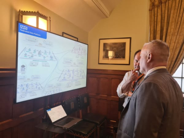 Richard Fuller MP being shown the Federated Data Platform in Parliament