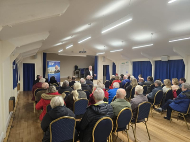 Richard addressing a town hall meeting in Ravensden