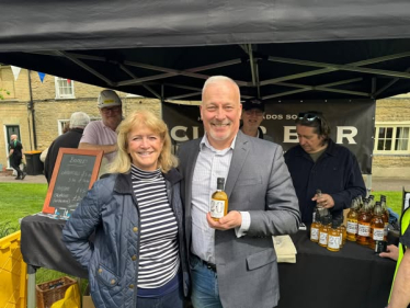 Richard Fuller with Alison Foster at the Harrold Calvados Society Stand