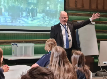 Richard Fuller MP talking to students in Parliament from Edward Peake School Biggleswade 