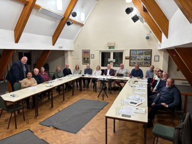 Richard Fuller MP chairing the latest Stop East Park Energy meeting in October 2025