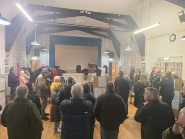 Residents at a meeting to discuss the new town at Tempsford Memorial Hall