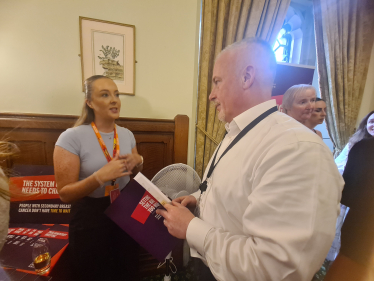 Richard Fuller MP with Abi from Breast Cancer Now at a drop-in event in Parliament
