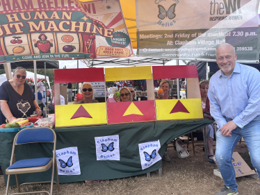 Richard Fuller MP playing the human fruit machine run by the Clapham Belles WI